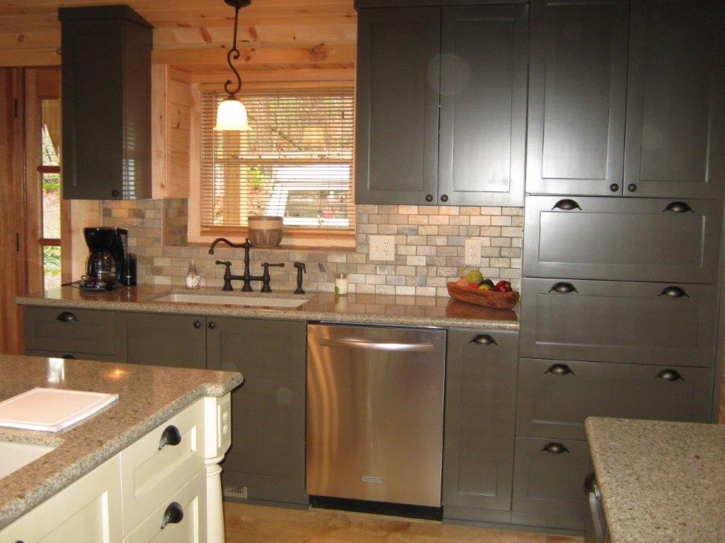 Finished kitchen 2 - sink stone backsplash with gray cabinets and dishwasher.