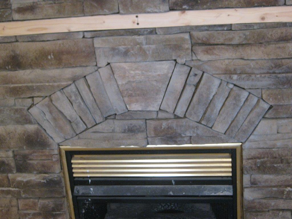 Stone work fireplace with keystone